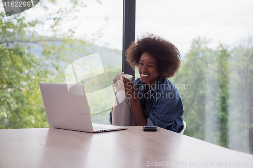 Image of African American woman in the living room