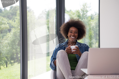 Image of African American woman in the living room