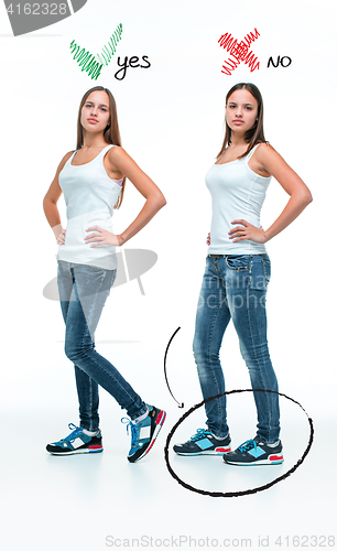 Image of conceptual portrait of two beautiful twin young women