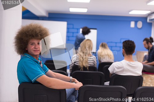 Image of Portrait of young informal businessman
