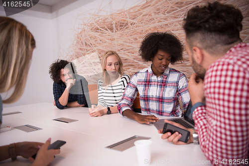 Image of Multiethnic startup business team on meeting