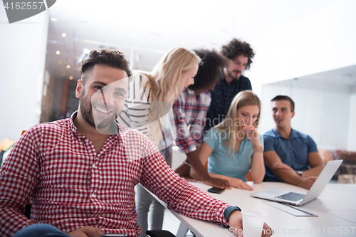 Image of Portrait of young informal businessman