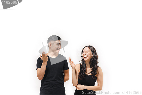 Image of Portrait of smiling Korean couple isolated on white