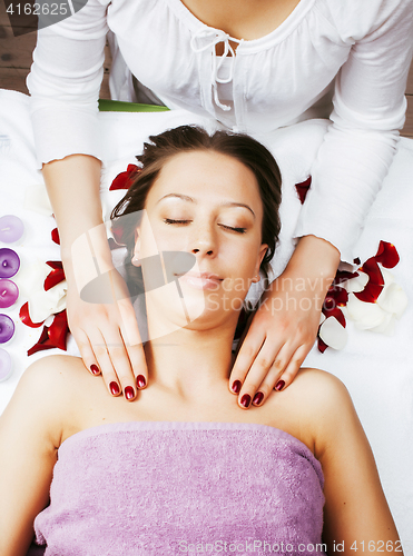 Image of stock photo attractive lady getting spa treatment in salon, heal
