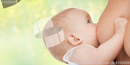 Image of close up of breastfeeding baby