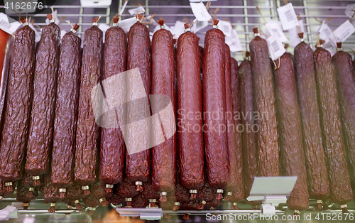 Image of salami sausage at grocery store stall