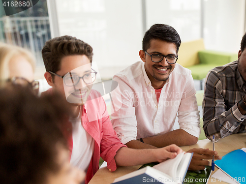 Image of group of high school students sitting at table