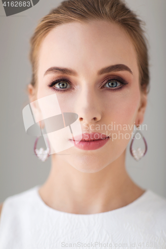 Image of face of beautiful woman or bride in white dress