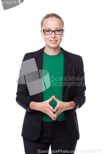 Image of Business woman standing with arms crossed against white background..