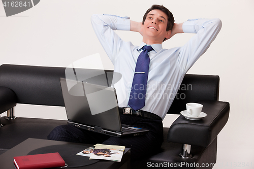 Image of Young Emotional Man In A Business Suit