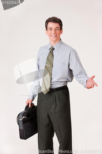 Image of Young Emotional Man In A Business Suit