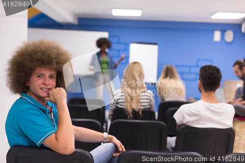 Image of Portrait of young informal businessman