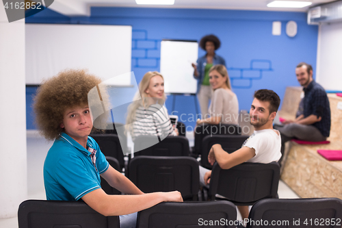 Image of Portrait of young informal businessman