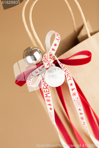 Image of Gift bag with Merry Christmas ribbon