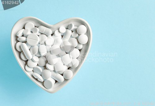 Image of bowl of white pills