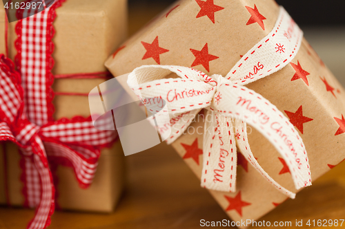 Image of Christmas presents in kraft paper