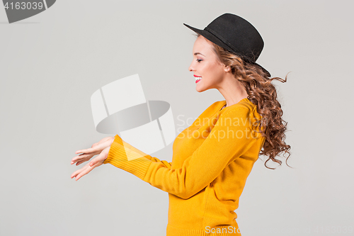 Image of The profile of girl in hat