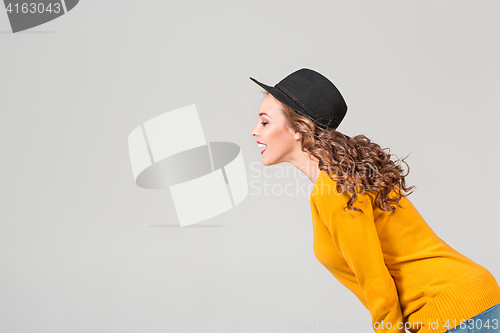 Image of The profile of girl in hat