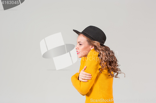 Image of The profile of girl in hat