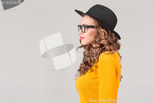 Image of The profile of girl in hat