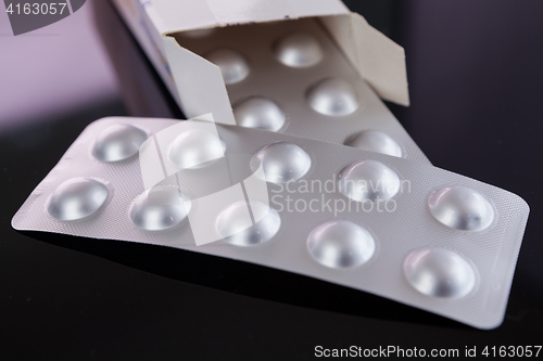 Image of Silver blister pack of small pills