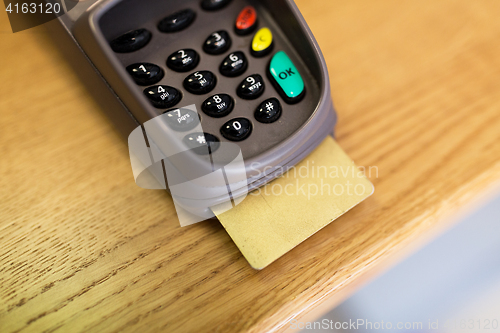 Image of close up of bank card reader or atm terminal