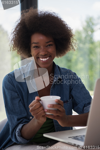 Image of African American woman in the living room