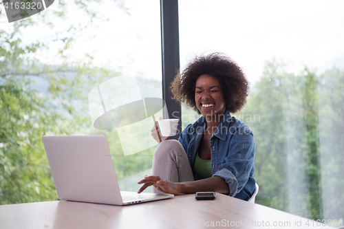 Image of African American woman in the living room