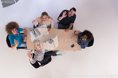 Image of Multiethnic startup business team on meeting  top view