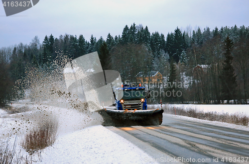 Image of Scania Snowplow Truck Removes Snow From Road
