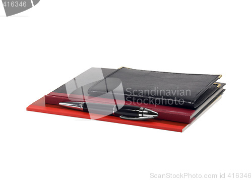 Image of notebooks and pen