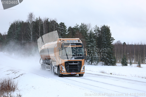 Image of Volvo FH Semi Tank Truck on Snowy Highway 