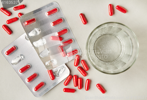 Image of red medicine pills