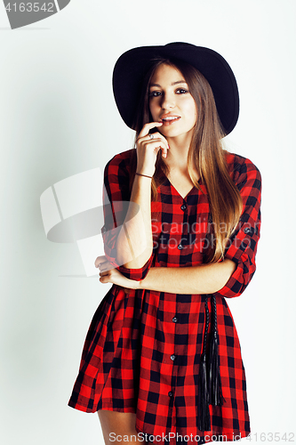 Image of young pretty brunette girl hipster in hat on white background casual close up dreaming smiling. real american modern woman, lifestyle real people concept