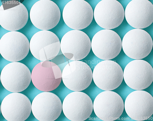 Image of white and pink pills