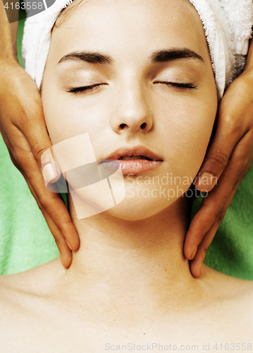 Image of stock photo attractive lady getting spa treatment in salon
