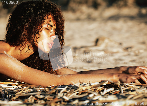 Image of young pretty girl asian face curly hairstyle at beach