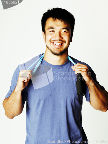 Image of young pretty asian man in blue tshirt on white background isolat