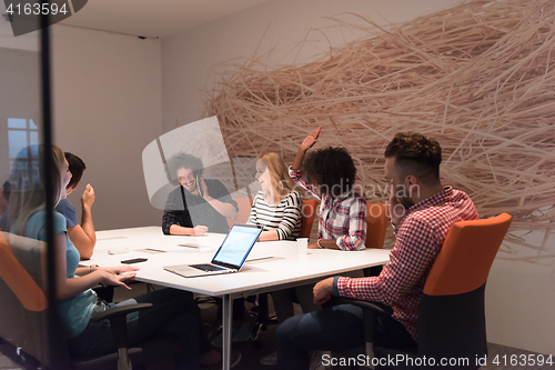 Image of Multiethnic startup business team on meeting