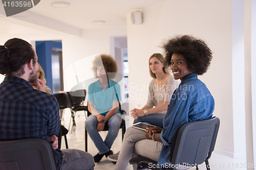 Image of Multiethnic startup business team on meeting