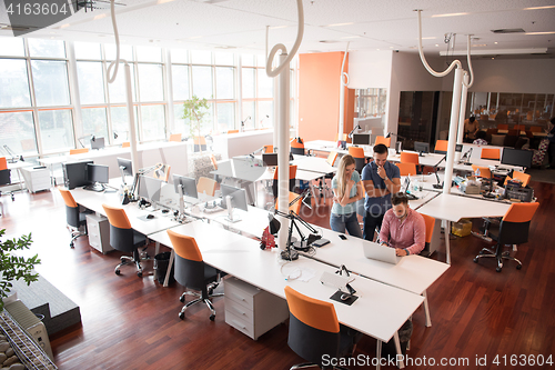 Image of Group of young people employee workers with computer