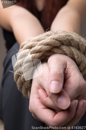 Image of Related hands of victim girl