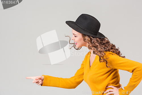 Image of The profile of girl in hat