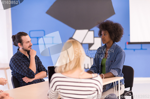 Image of Multiethnic startup business team on meeting