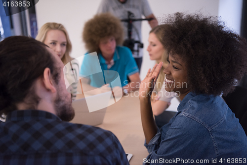 Image of Multiethnic startup business team on meeting