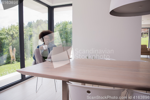 Image of African American woman in the living room