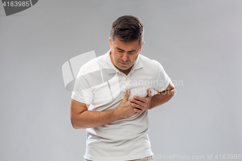 Image of unhappy man suffering from heart ache