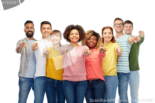 Image of international group of people pointing on you