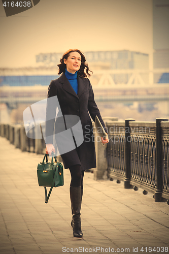 Image of beautiful smiling businesswoman