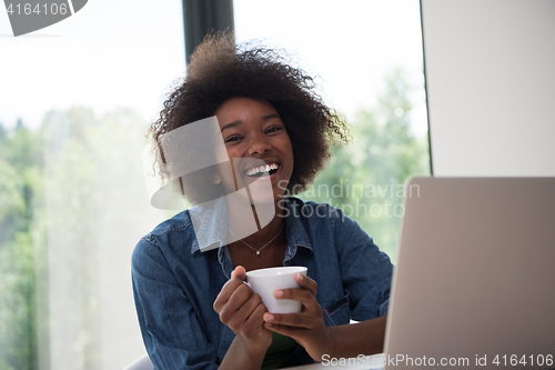 Image of African American woman in the living room